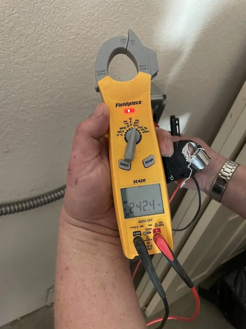 Voltage testing with clamp meter during Aluminum Wiring Replacement in Carrboro